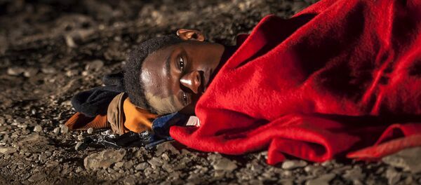 Un réfugié africain - Sputnik Afrique