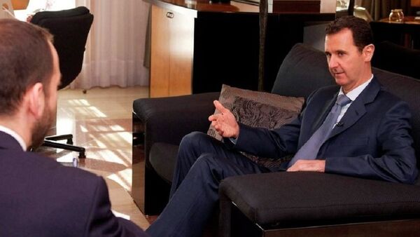 Bachar el-Assad, président de la Syrie, lors d'une interview au magazine Foreign Affairs - Sputnik Afrique