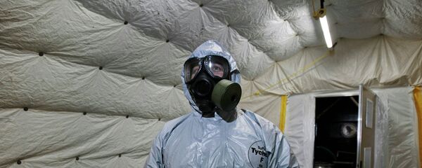 Costume de protection chimique. Image d'illustration - Sputnik Afrique