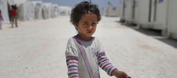 Une réfugiée syrienne - Sputnik Afrique