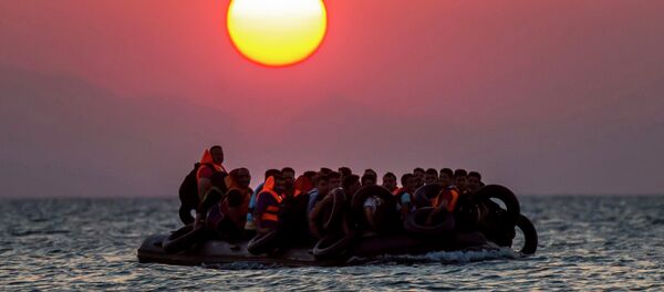 Une embarcation de migrants - Sputnik Afrique