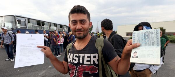 un migrant - Sputnik Afrique