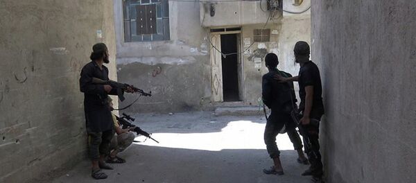 Des combattants du groupe terroriste Etat islamique en Syrie Des combattants du groupe terroriste Etat islamique en Syrie - Sputnik Afrique