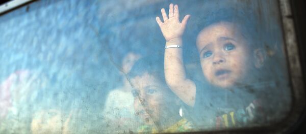 Un petit migrant - Sputnik Afrique