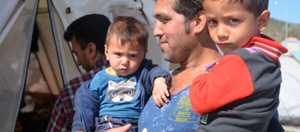 Des migrants - Sputnik Afrique