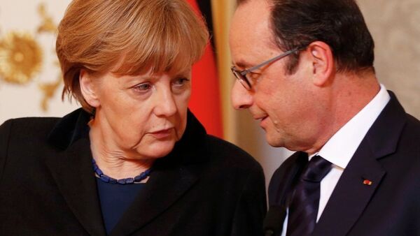 François Hollande et Angela Merkel. Archives - Sputnik Afrique