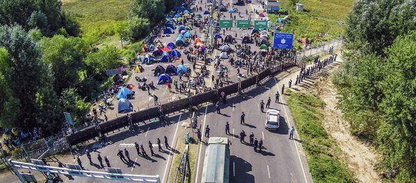 Migrants - Sputnik Afrique