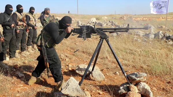 Rebel fighters from the First Battalion under the Free Syrian Army take part in a military training on June 10, 2015, in the rebel-held countryside of the northern city of Aleppo - Sputnik Afrique