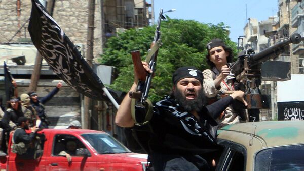 Fighters from Al-Qaeda's Syrian affiliate Al-Nusra Front drive in the northern Syrian city of Aleppo. - Sputnik Afrique