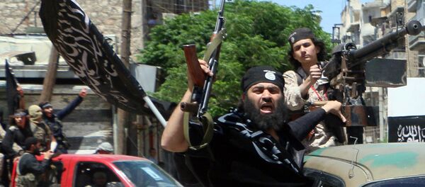 Fighters from Al-Qaeda's Syrian affiliate Al-Nusra Front drive in the northern Syrian city of Aleppo. - Sputnik Afrique