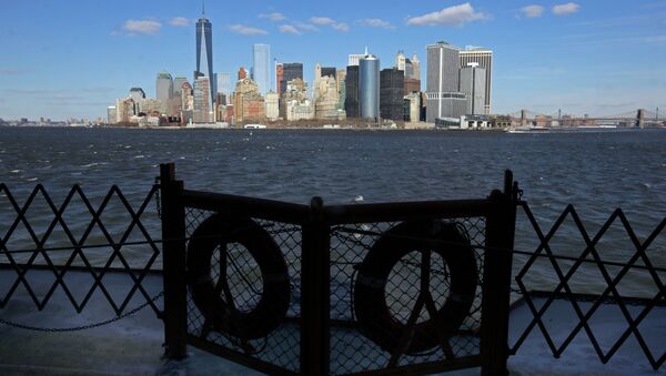 Lower Manhattan appears behind a pair life preservers on a Staten Island Ferry in New York Harbor. - Sputnik Afrique