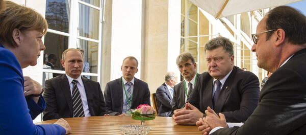 Poutine, Hollande, Merkel et Porochenko - Sputnik Afrique