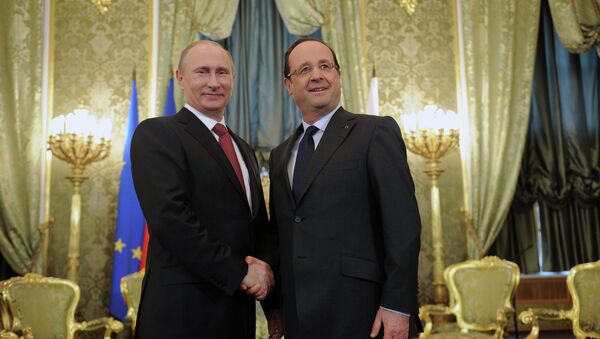 Une rencontre de Vladimir Poutine et François Hollande au Kremlin - Sputnik Afrique