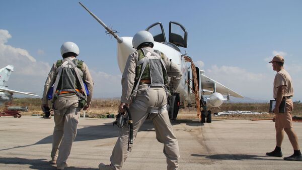 Préparation d'un vol depuis la base aérienne de Hmeimim en Syrie. - Sputnik Afrique