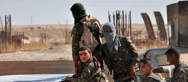 Combattants des Unités de protection du peuple (YPG) - Sputnik Afrique