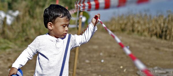 enfant des migrants - Sputnik Afrique