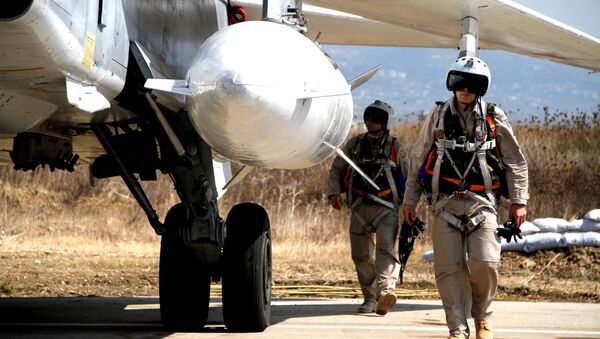 Pilotos rusos en el aeródromo de Hmeymim, Siria - Sputnik Afrique