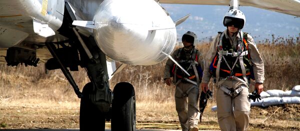 Groupe d'aviation militaire russe à la base aérienne Hmeymim en Syrie - Sputnik Afrique