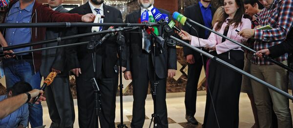 Denis Pouchiline et Vladislav Deïnego, négociateurs des Républiques populaires autoproclamées de Donetsk (DNR) et de Lougansk (LNR), le 6 octobre, Minsk - Sputnik Afrique