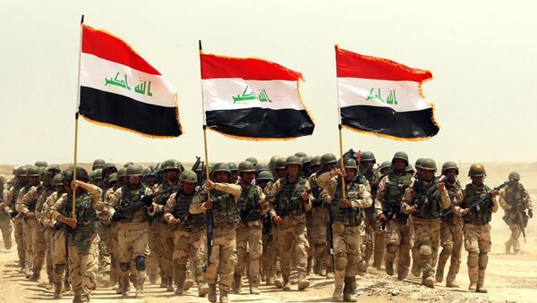 Soldats irakiens prennent part à un exercice de formation mené par l'armée américaine près de Bagdad, le 27 mai 2015 - Sputnik Afrique