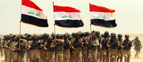 Soldats irakiens prennent part à un exercice de formation mené par l'armée américaine près de Bagdad, le 27 mai 2015 Soldats irakiens prennent part à un exercice de formation mené par l'armée américaine près de Bagdad, le 27 mai 2015 - Sputnik Afrique