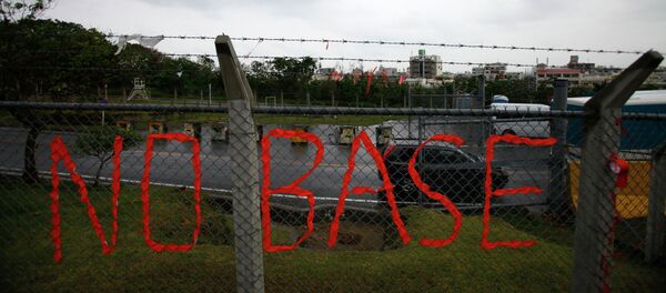 Un slogan contre la base US,Okinawa - Sputnik Afrique
