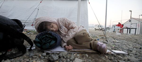 Un enfant migrant - Sputnik Afrique