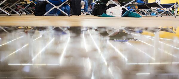 Les réfugiés dans leur logement temporaire - Sputnik Afrique