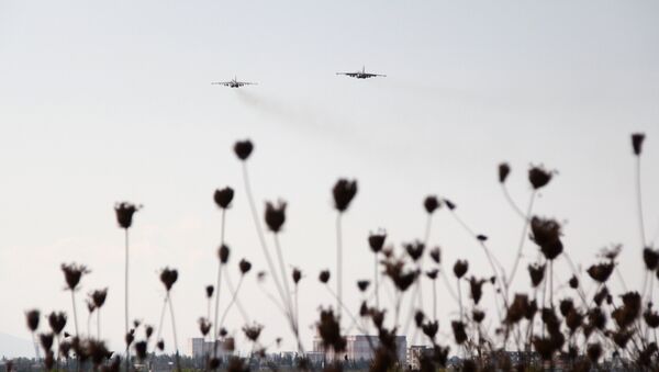 Avions russes à la base aérienne Hmeymim en Syrie - Sputnik Afrique