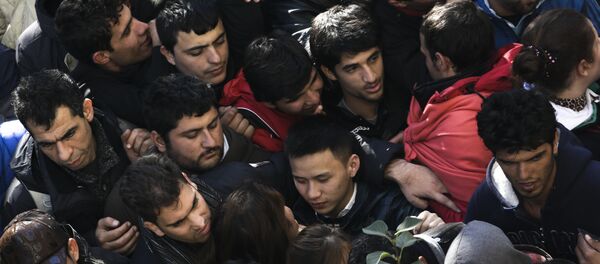 Des migrants - Sputnik Afrique