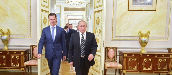 Le président syrien Bachar Al-Assad et le président russe Vladimir Poutine, Kremlin - Sputnik Afrique