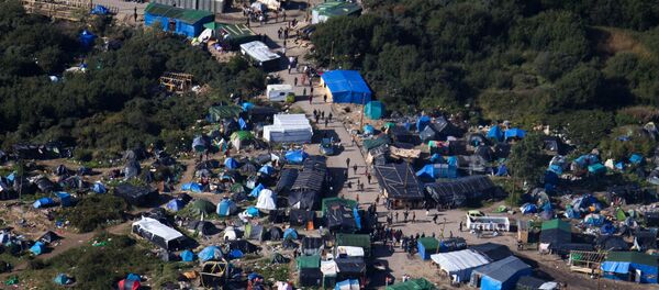 Camp près de Calais - Sputnik Afrique
