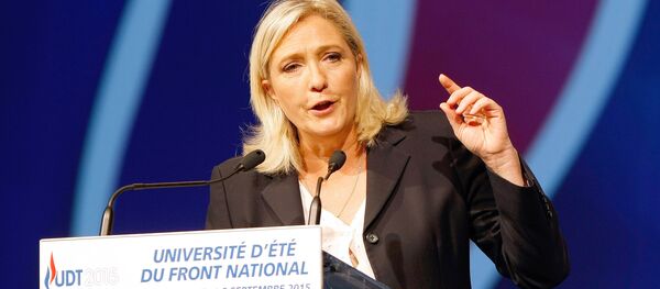 President of France's far right National Front party Marine Le Pen, delivers her speech during their summer meeting, in Marseille, southern France, Saturday, Sep. 6, 2015 - Sputnik Afrique