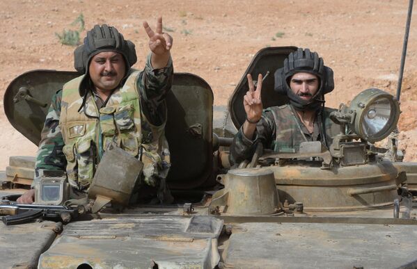 Des combattants de l’armée arabe syrienne près de la ville de Qatana - Sputnik Afrique