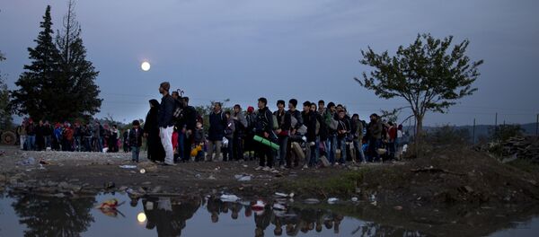 migrants - Sputnik Afrique