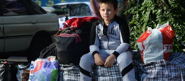des réfugiés de Donetsk en Russie - Sputnik Afrique