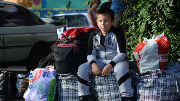 des réfugiés de Donetsk en Russie - Sputnik Afrique