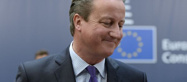 British Prime Minister David Cameron arrives to take part in a European Union (EU) summit dominated by the migration crisis at the European Council in Brussels, on October 15, 2015 - Sputnik Afrique
