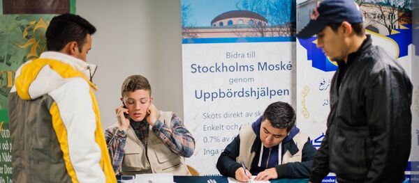 les réfugiés dans un centre d'accueil suédois - Sputnik Afrique