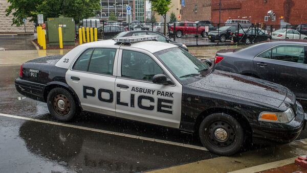 Police car in the rain, Asbury Park, New Jersey - Sputnik Afrique