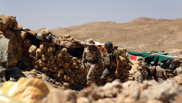 kurdes irakiens gardent une position derrière des sacs de sable,Sinjar - Sputnik Afrique