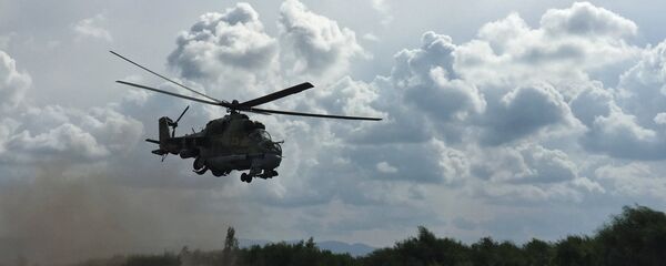 L'hélicoptère russe MI-24 à la base aérienne de Hmeimim en Syrie L'hélicoptère russe MI-24 à la base aérienne de Hmeimim en Syrie - Sputnik Afrique