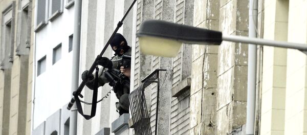 Les forces spéciales belges en intervention à Molenbeek. Le 16 novembre 2015 - Sputnik Afrique