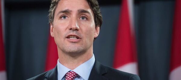 Canadian Liberal Party leader Justin Trudeau speaks at a press conference in Ottawa on October 20, 2015 after winning the general elections - Sputnik Afrique