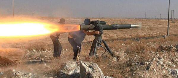 In this picture released on June 26, 2015, by a website of Islamic State militants, Islamic State militants fire an anti-tank missile in Hassakeh, northeast Syria - Sputnik Afrique