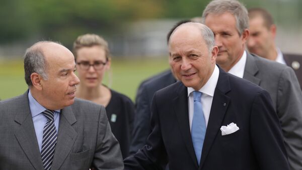 French Foreign Minister Laurent Fabius, right, talks with his Brazilian counterpart Mauro Vieira, during his arrival to meet with Brazil’s President Dilma Rousseff, at the Alvorada Palace, in Brasilia, Brazil, Sunday, Nov. 22, 2015. - Sputnik Afrique