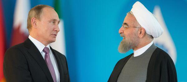Vladimir Poutine (à droite) et Hassan Rohani - Sputnik Afrique