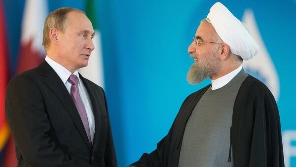 Vladimir Poutine (à droite) et Hassan Rohani - Sputnik Afrique