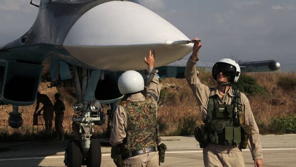 Préparation d'un vol depuis la base aérienne de Hmeimim en Syrie. - Sputnik Afrique