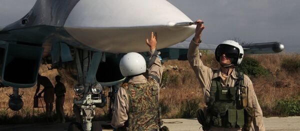 Préparation d'un vol depuis la base aérienne de Hmeimim en Syrie. - Sputnik Afrique